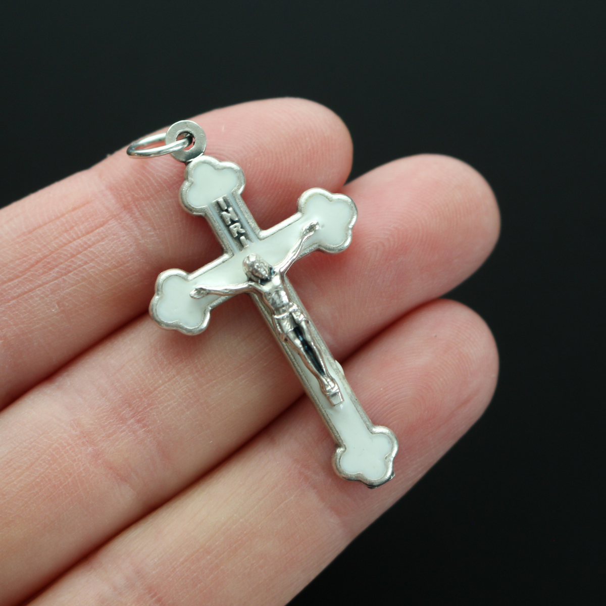 Orthodox Byzantine die-cast metal crucifix with a pearlized white enamel inlay